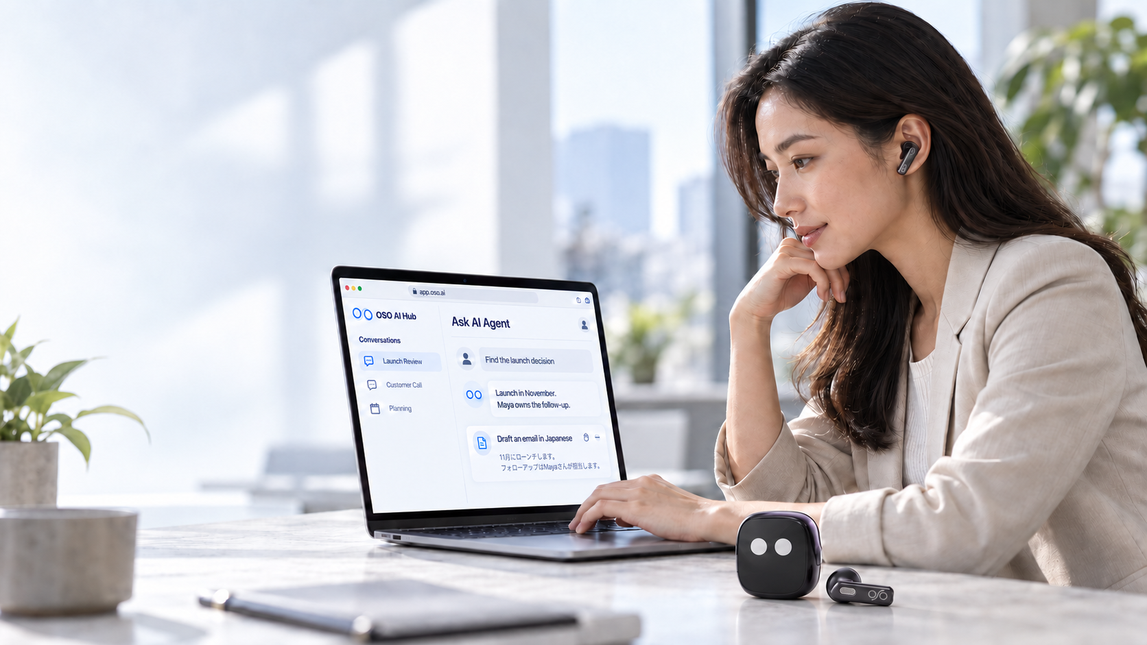 OSO AI Agent on a MacBook with a woman wearing OSO earbuds and the smart charging case on the desk