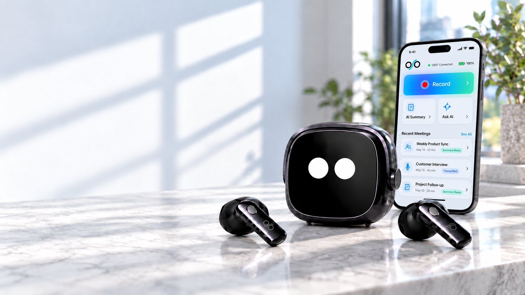 OSO² earbuds and smart charging case beside the OSO app on a bright desk